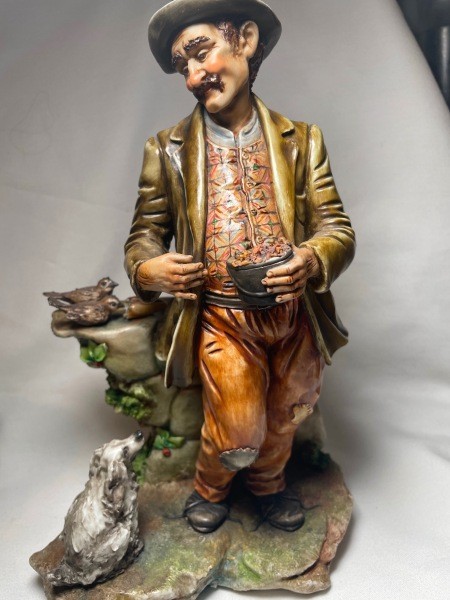 A figurine of an older man.