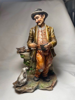 A figurine of an older man.