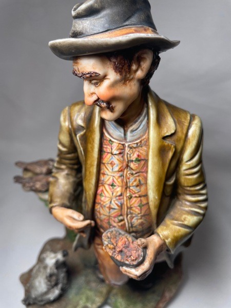 A figurine of an older man.
