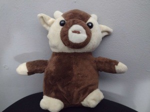 A brown and white stuffed animal.