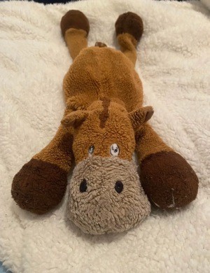 A brown stuffed horse.