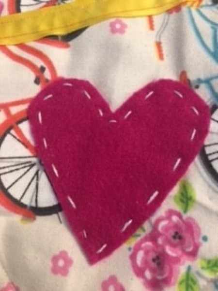 Adding a smaller heart to the front of the stocking.