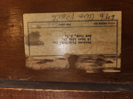 A label on the bed frame.