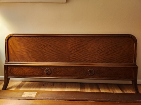 A vintage wooden bed frame.