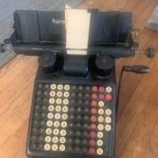 A vintage Burroughs adding machine.