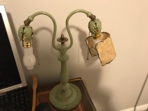An old fashioned desk lamp.