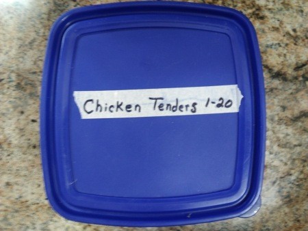 Storing the chicken tenders in the freezer.