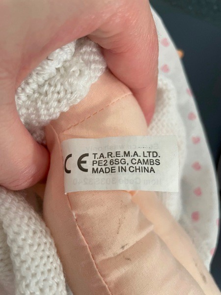 A tag on a doll.