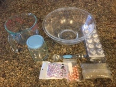 Supplies for lighted floating pearl centerpiece.