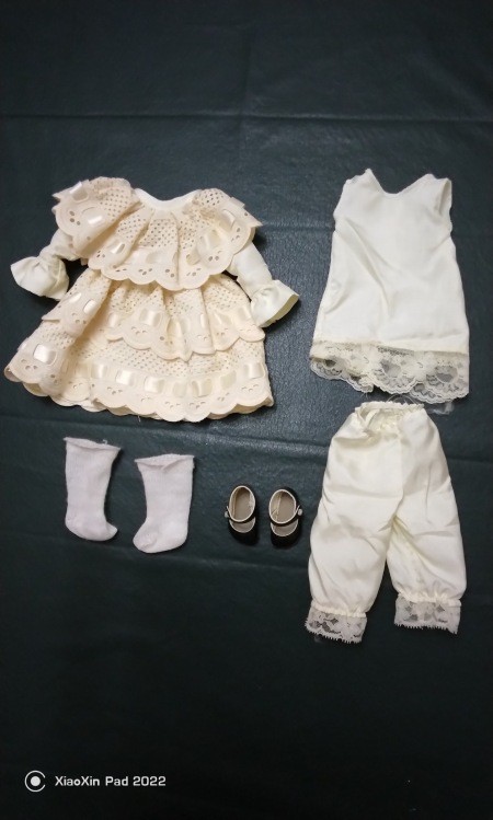The doll clothes.
