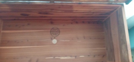 Markings on the inside of a cedar chest.