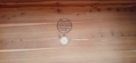 Markings inside a cedar chest.