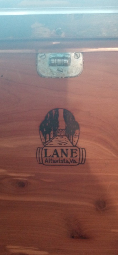 Markings on the inside of a cedar chest.