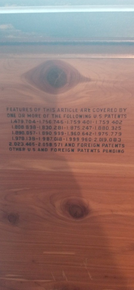 Markings on the inside of a cedar chest.