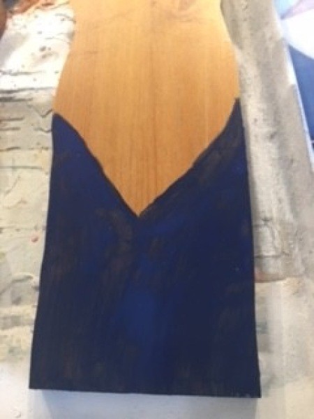 Painting the gnome figure.