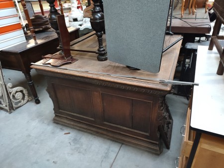 An old wooden double sided desk.