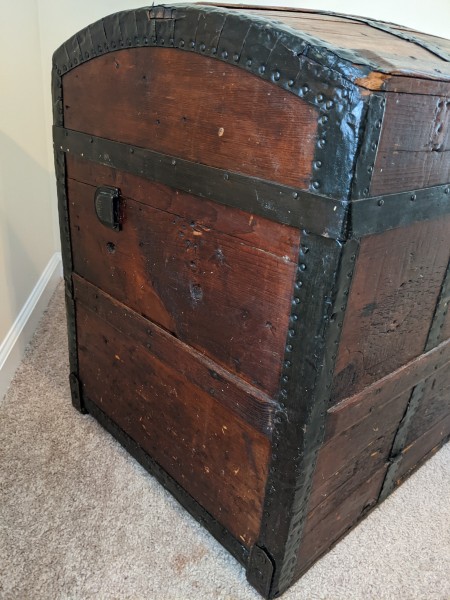The side of a steamer trunk.