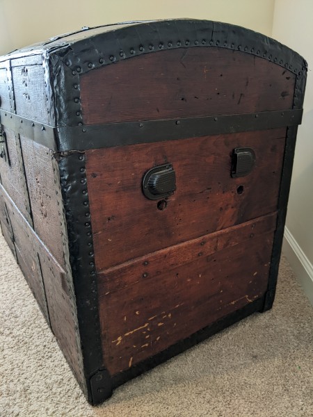 The side of a steamer trunk.
