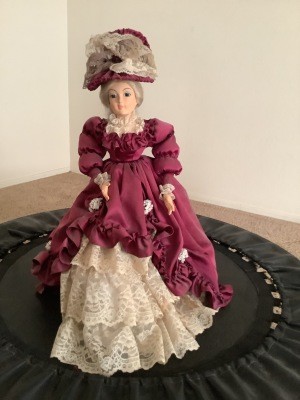 An old fashioned porcelain doll.