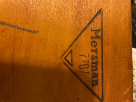 The Mersman logo on a table.