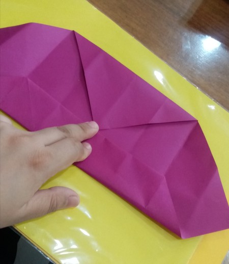 Constructing the origami box.