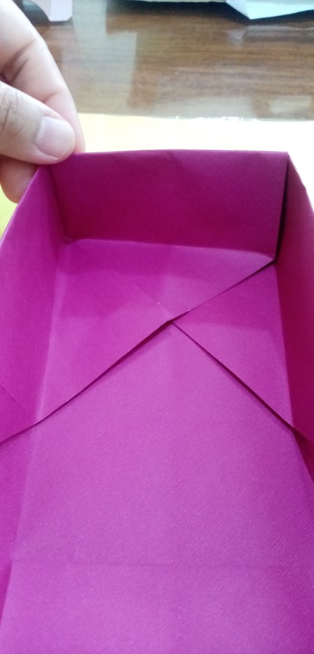 Constructing the origami box.