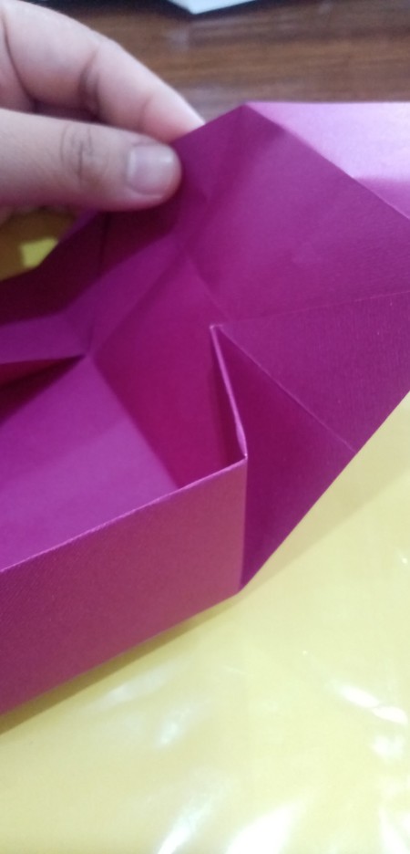 Constructing the origami box.