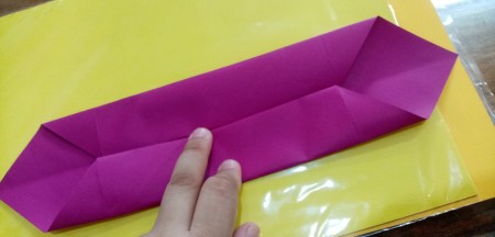 Constructing the origami box.