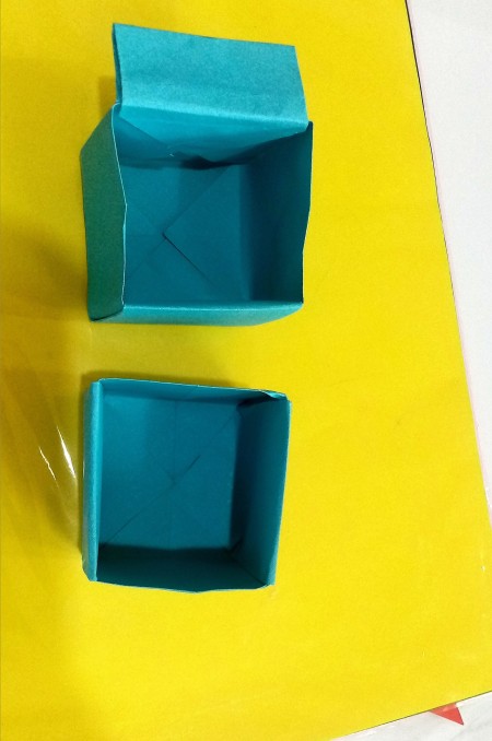 The two folded boxes.