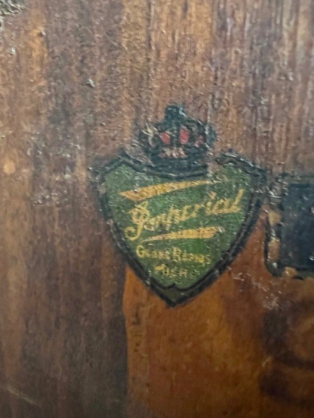 The manufacturer's marking on the underside of the table.