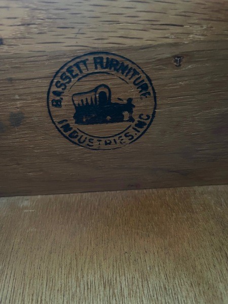 The Bassett furniture logo inside a drawer.