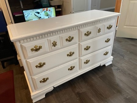 A white dresser with 6 drawers.