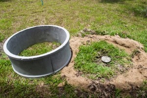 A septic tank in a yard.