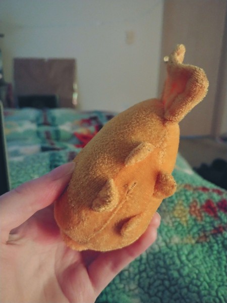 The underside of a stuffed fish.