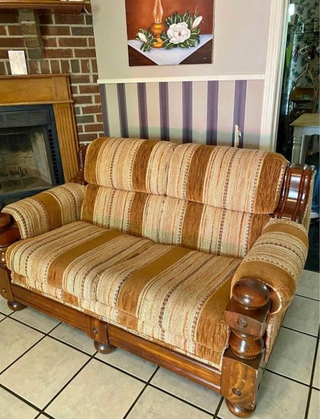A vintage upholstered love seat.