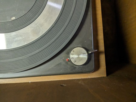 The record player in a stereo console.