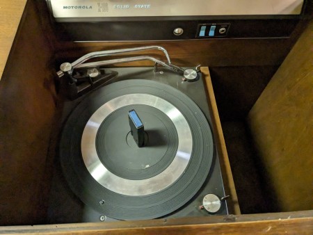 The record player in a stereo console.