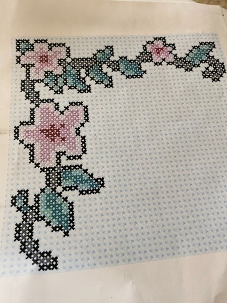 A sample of a cross stitched border.