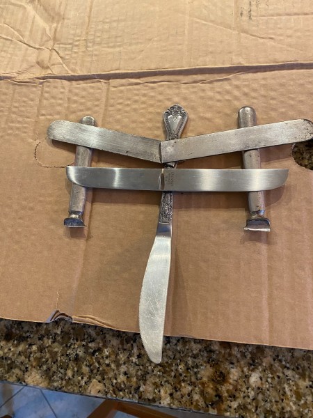 Attaching the knife blades to the dragonfly body.