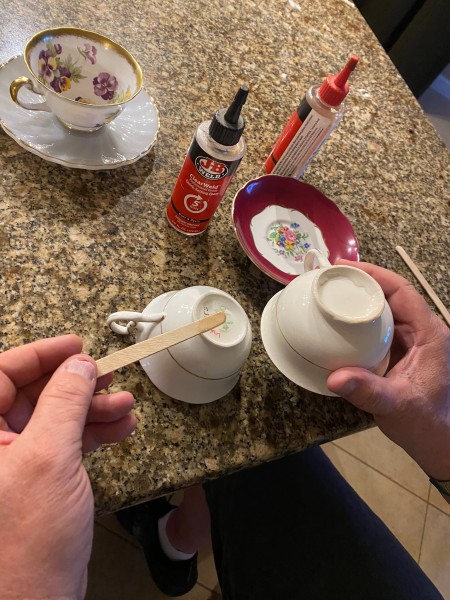 Glueing the bottom of the china cups.