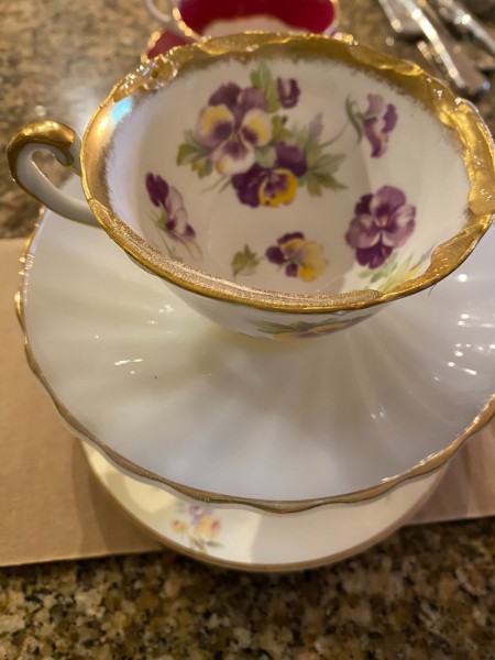 Putting the china cups together.