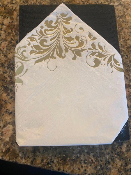 Adding decorative paper to the back of the shadowbox.