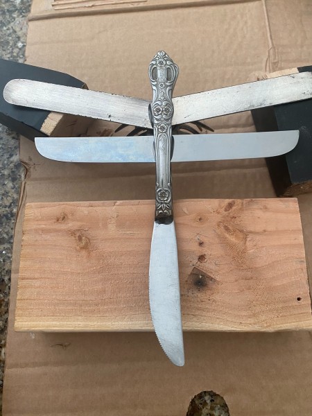 Using the knife blades to create a dragonfly.