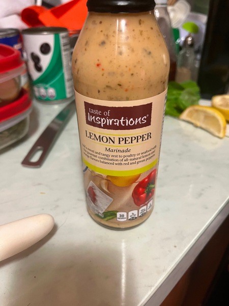 A bottle of lemon pepper marinade.