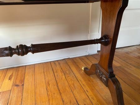 The bottom of the desk.