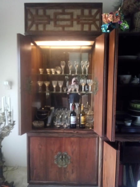 An open entertainment cabinet.