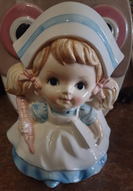 A figurine of a nurse.