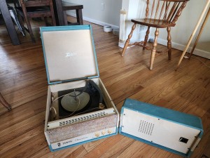 A portable record player.