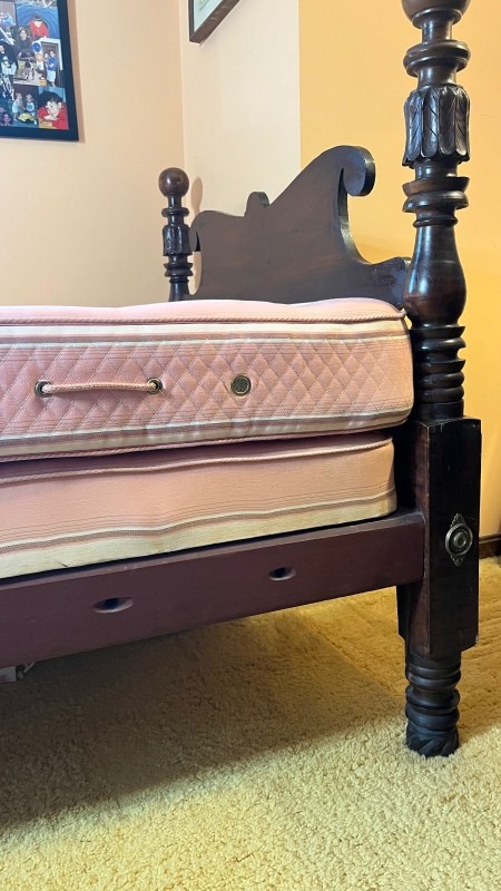 The headboard of a bed.