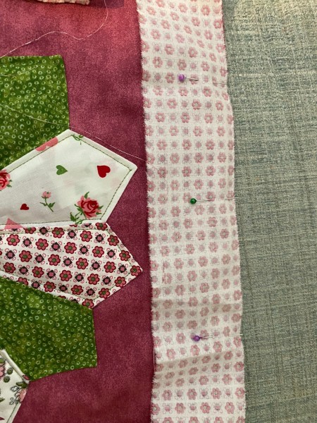 Sewing the quilt block together.